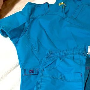 Bright Teal blue with pink accents Wonderflex scrubs